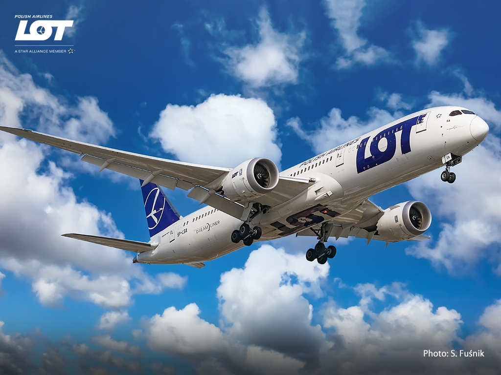 Passenger airplane against a sky with clouds.